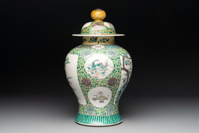 A pair of Chinese verte-biscuit 'cranes and flowers' vases and covers, 19th C.