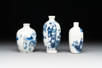 Three Chinese blue, white and copper-red snuff bottles with figural design, Yongzheng and Qianlong mark, 19th C.