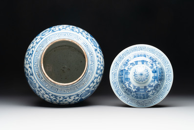 Two Chinese blue and white 'double happiness' covered vases and two 'meiping' vases, Kangxi mark, 19th C.