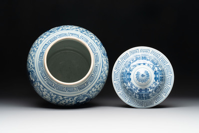 Two Chinese blue and white 'double happiness' covered vases and two 'meiping' vases, Kangxi mark, 19th C.