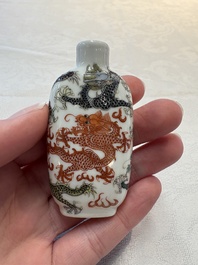 Four Chinese famille rose and verte snuff bottles, dragon and Qianlong marks, 19th C.