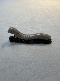 A rare Chinese ge-type model of a silkworm on wooden stand, 18th C.