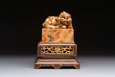An unusual Chinese marble-glazed 'Qianlong Yu Bi 乾隆御筆' seal and stand, Qianlong mark, Republic