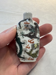 Four Chinese famille rose and verte snuff bottles, dragon and Qianlong marks, 19th C.