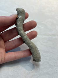 A rare Chinese ge-type model of a silkworm on wooden stand, 18th C.
