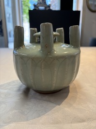 A Chinese Longquan celadon quintuple-tube vase, Yuan