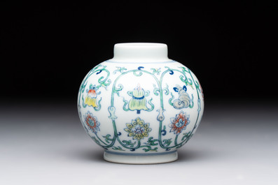 A Chinese doucai 'bajixiang' vase with a reticulated wooden cover, Yongzheng mark, 19/20th C.