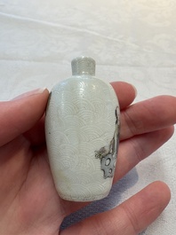 Four Chinese famille rose and verte snuff bottles, dragon and Qianlong marks, 19th C.