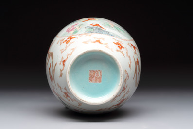 A Chinese famille rose vase and a small qianjiang cai vase, Qianlong mark, 19th C.