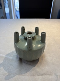 A Chinese Longquan celadon quintuple-tube vase, Yuan