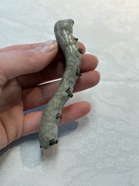 A rare Chinese ge-type model of a silkworm on wooden stand, 18th C.