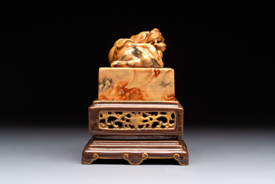 An unusual Chinese marble-glazed 'Qianlong Yu Bi 乾隆御筆' seal and stand, Qianlong mark, Republic