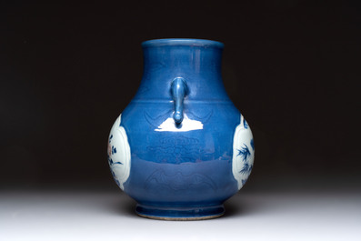 A Chinese blue, white and copper-red powder-blue-ground 'hu' vase, Qianlong
