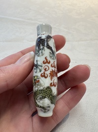 Four Chinese famille rose and verte snuff bottles, dragon and Qianlong marks, 19th C.