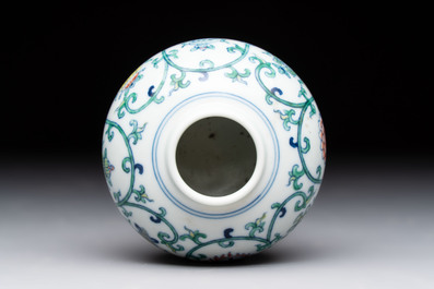 A Chinese doucai 'bajixiang' vase with a reticulated wooden cover, Yongzheng mark, 19/20th C.