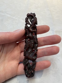 A rare Chinese ge-type model of a silkworm on wooden stand, 18th C.