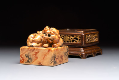 An unusual Chinese marble-glazed 'Qianlong Yu Bi 乾隆御筆' seal and stand, Qianlong mark, Republic