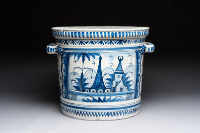 A large blue and white jardini&egrave;re with landscape design, Nevers, 18th C.