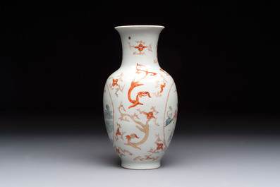 A Chinese famille rose vase and a small qianjiang cai vase, Qianlong mark, 19th C.