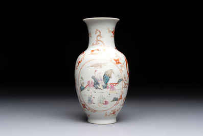 A Chinese famille rose vase and a small qianjiang cai vase, Qianlong mark, 19th C.