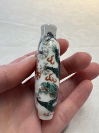 Four Chinese famille rose and verte snuff bottles, dragon and Qianlong marks, 19th C.