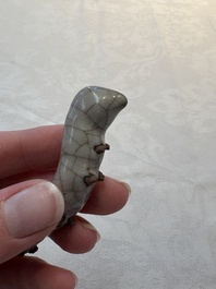 A rare Chinese ge-type model of a silkworm on wooden stand, 18th C.