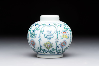 A Chinese doucai 'bajixiang' vase with a reticulated wooden cover, Yongzheng mark, 19/20th C.