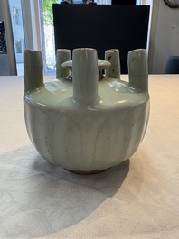 A Chinese Longquan celadon quintuple-tube vase, Yuan