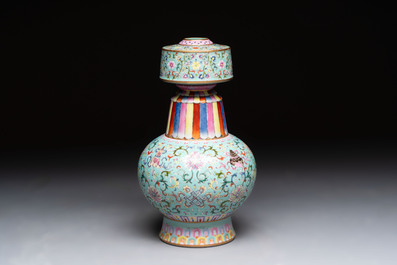 A Chinese famille rose altar vase with 'bajixiang' design, 'benbahu', Qianlong mark, 20th C.