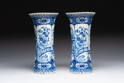 A blue and white Dutch Delft garniture of five vases and covers, 19th C.