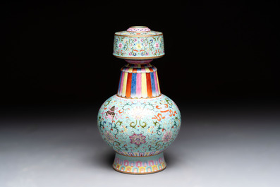 A Chinese famille rose altar vase with 'bajixiang' design, 'benbahu', Qianlong mark, 20th C.
