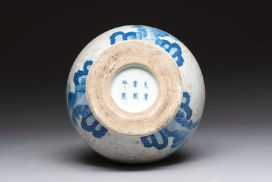 A Chinese blue, white and copper-red garlic-mouth vase with mythical animals, Kangxi mark, 19th C.