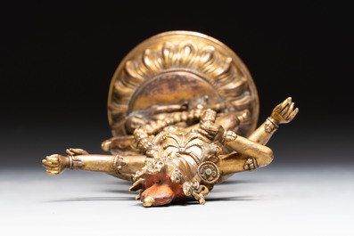 A Nepalese or Tibetan turquoise-inlaid gilt-bronze sculpture of Kurukulla or red Tara, 15th C. or later