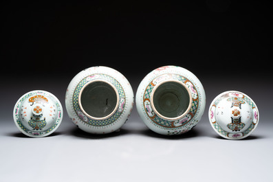Four Chinese famille rose 'flower basket' vases, two with cover, signed Wu Yu 吴玉, dated 1912
