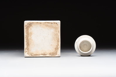 A Chinese blue and white square flask and cover with floral design, Kangxi