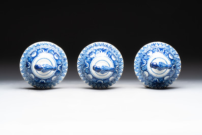 A blue and white Dutch Delft garniture of five vases and covers, 19th C.