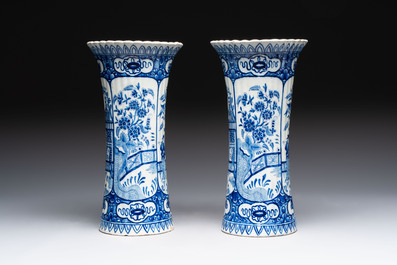 A blue and white Dutch Delft garniture of five vases and covers, 19th C.