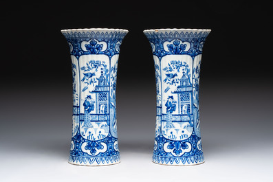 A blue and white Dutch Delft garniture of five vases and covers, 19th C.