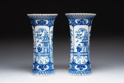 A blue and white Dutch Delft garniture of five vases and covers, 19th C.