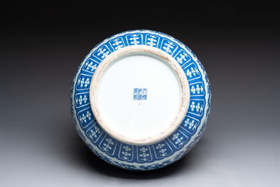 A Chinese blue, white and copper-red 'hu' vase with lotus scrolls, Qianlong mark, 19th C.