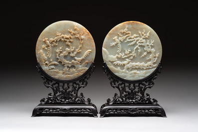 A pair of Chinese carved jade &lsquo;elephant&rsquo; plaques on wooden stands, 19th C.