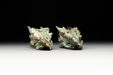 A collection of a bronze sculpture, three palanquin hooks and an elephant-form kendi, Cambodia, 13th C. and earlier