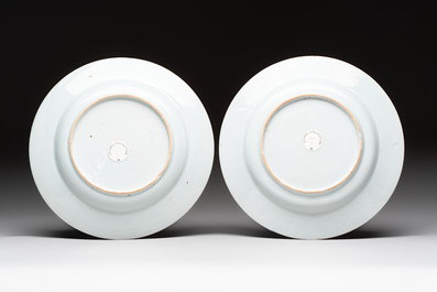 A pair of fine Chinese famille rose black-ground 'scrolls and flowers' plates, Yongzheng/Qianlong