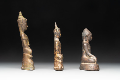 A varied collection of eight bronze Buddha figures, South Asia, 18/19th C.