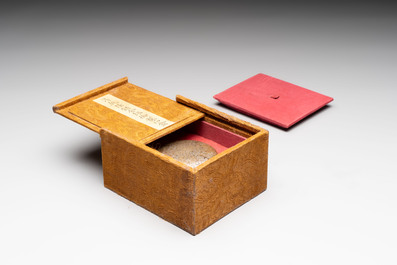 A Chinese gilt and silver inlaid bronze ink paste box and cover and with presentation box, Qianlong mark and possibly of the period