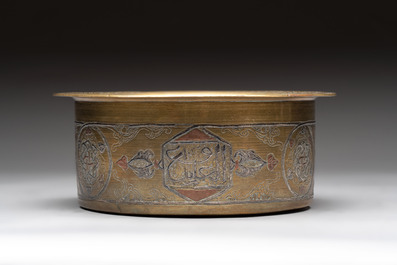 Three 'calligraphic' brass vessels, Qajar, 19/20th C.