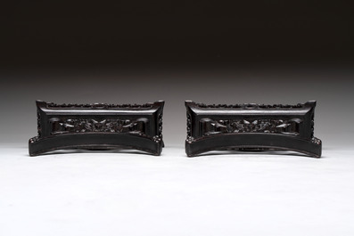 A pair of Chinese carved jade &lsquo;elephant&rsquo; plaques on wooden stands, 19th C.