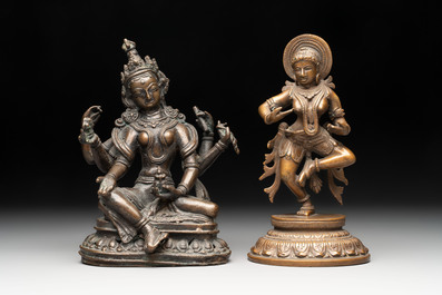 Seven bronze figures of deities and a religious relief plaque, India and Nepal, 18/19th C.