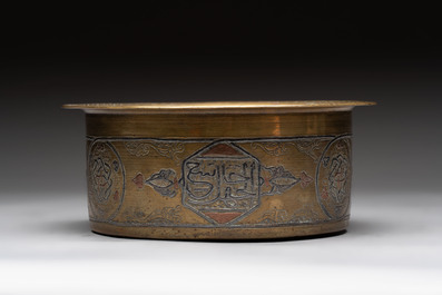 Three 'calligraphic' brass vessels, Qajar, 19/20th C.