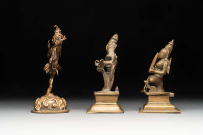 Seven bronze figures of deities and a religious relief plaque, India and Nepal, 18/19th C.